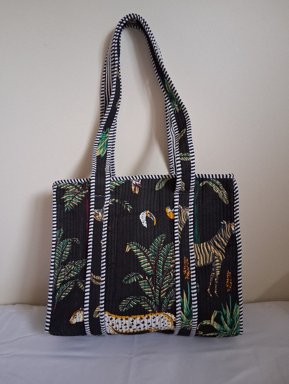 QUILTED BLACK TROPICAL PRINT TOTE BAG